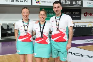 Kate Wright (middle) with Bronwen Adams and Justin Barnes after officiating the 2021 SSN Grand Final. Image: Netball Australia