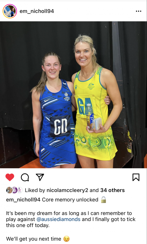 Em Nicholl sharing a moment with Gretel Bueta after Australia's defeat of Scotland at the 2022 Commonwealth Games