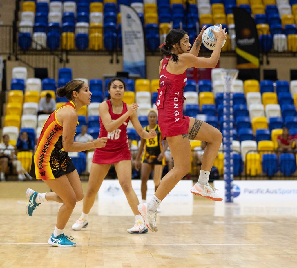 Hulita Veve In action against Papua New Guinea during the December PacificAus Sports Netball Series. Image: Netball Australia Facebook