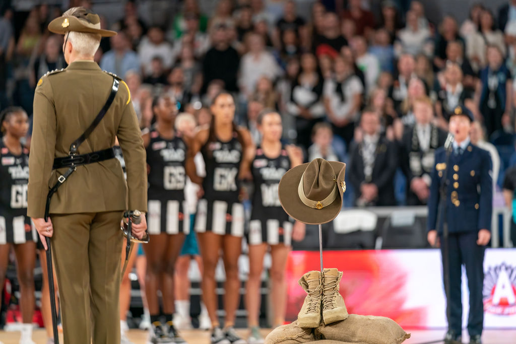 ANZAC Day comemoration ahead of the Magpies v Lightning match. Image: Shaun Sharp/Moments by Shaun