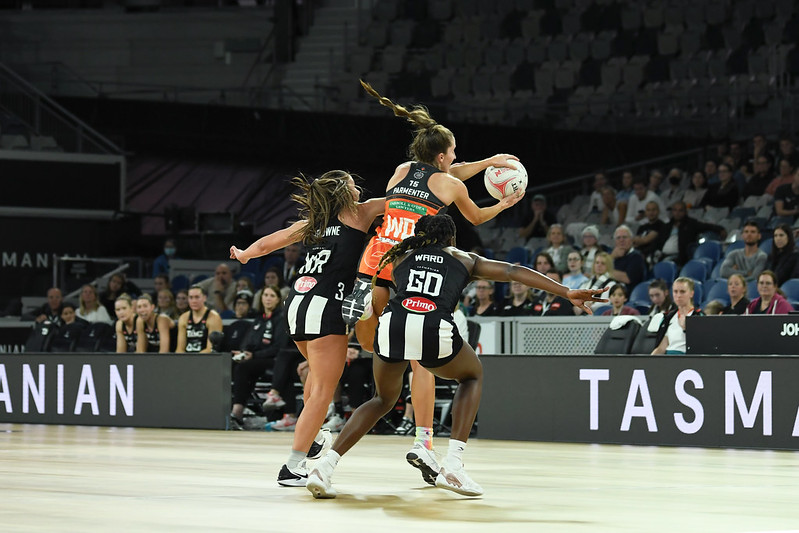 Amy Parmenter takes the ball despite some close attention from the Magpies. Image: Aliesha Vicars