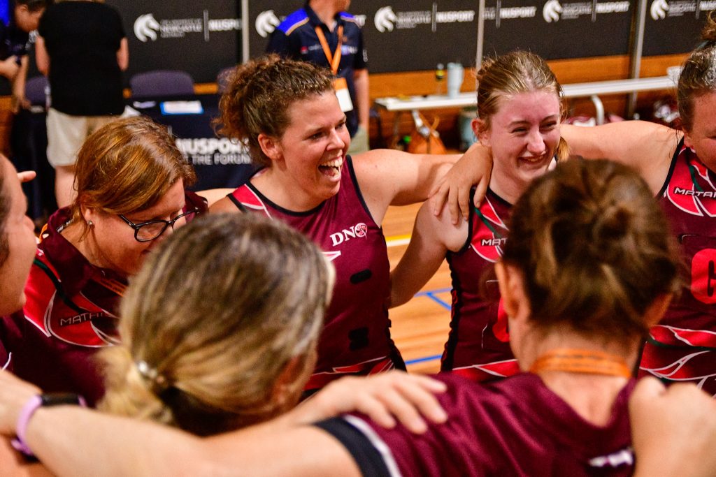 All smiles as Queensland take third place in the netball at the Australian Deaf Games. Image: Simon Leonard