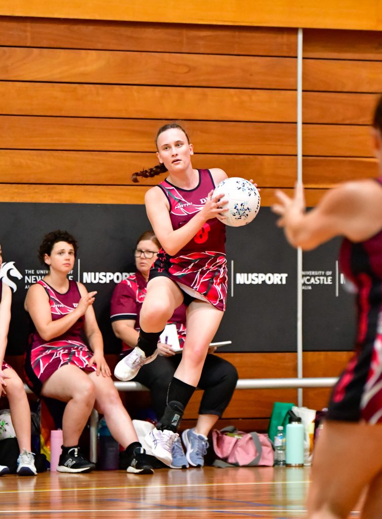 Mikayla Leonard in action for the Queensland Deaf Netball Team. Image: Simon Leonard