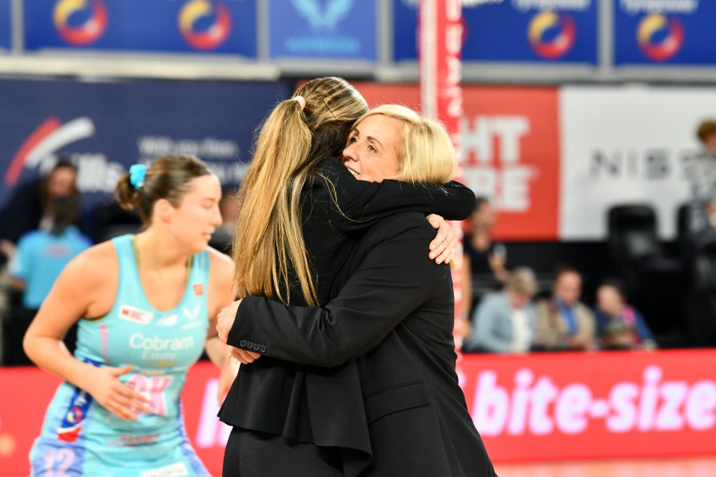 Shae Brown and Tracey Neville celebrate Mavericks first match with a hug. Image: Aliesha Vicars.